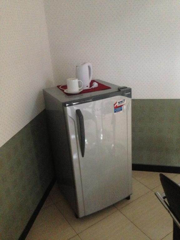 Global Inn Keluarga Sedati Szoba fotó